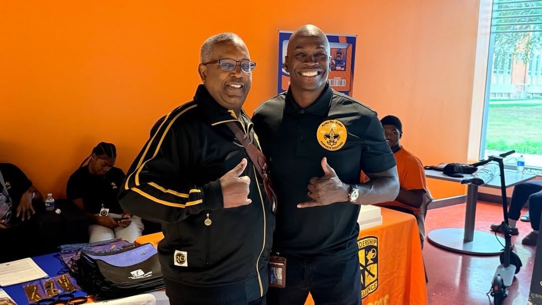 Two chapter brothers at Alpha Merit Badge University